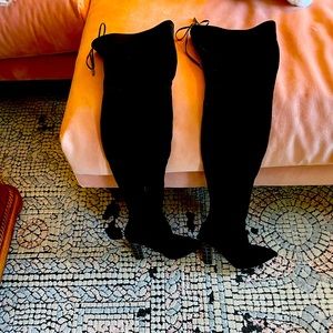 Bryan Atwood Stylish over the knee boots with a cool metallic detail!